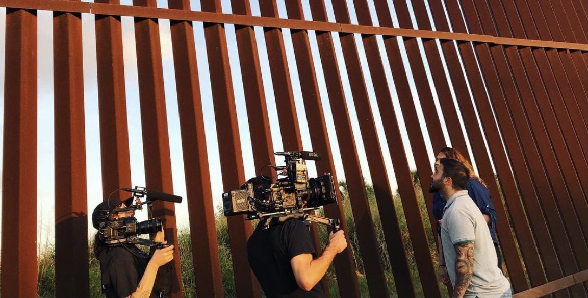 Tony Zosherafatain with Rebecca at Trump's border wall in Episode 2 of Trans in Trumpland. 